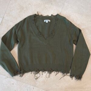 Wild Honey soft army green v neck sweater with distressed hem.  Size small